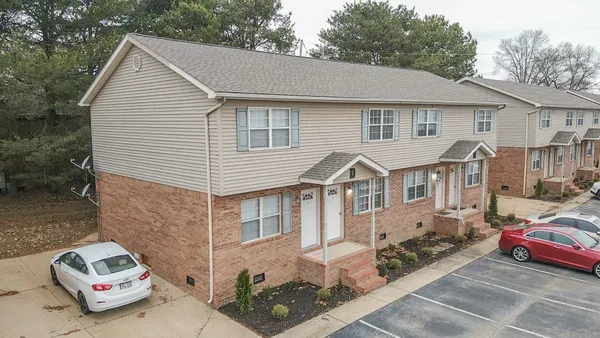 a view of a house with a patio