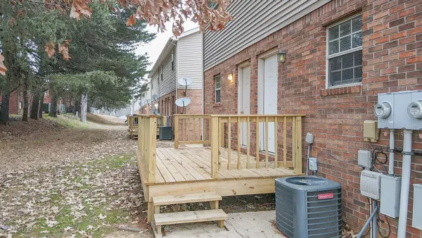 a view of a pathway with a house