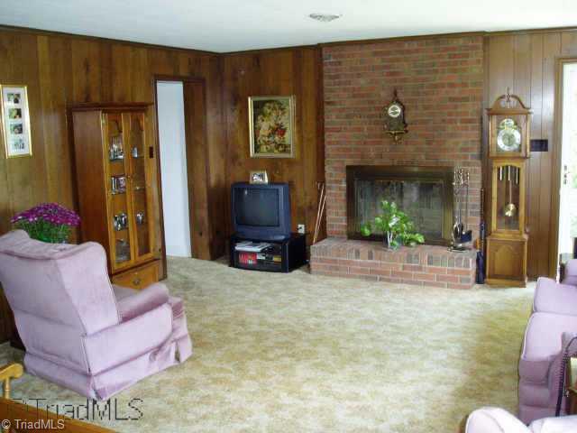 1603 Coventry Road High Point, NC 27262 - Photo 3 of 9 Other. Den with fireplace