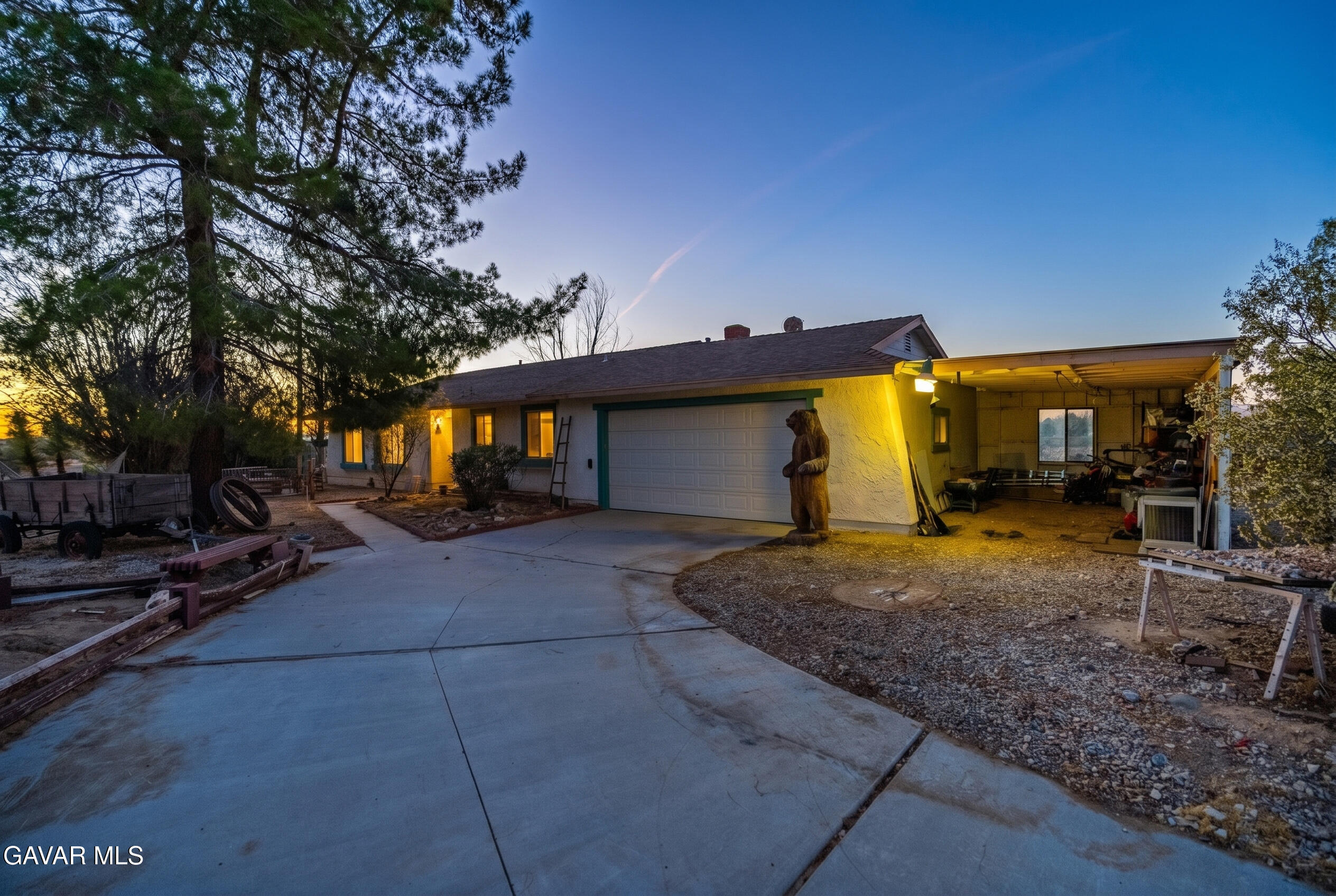 20539 East Ave R Palmdale, CA 93591 - Photo 7 of 55 a view of a house with backyard and porch