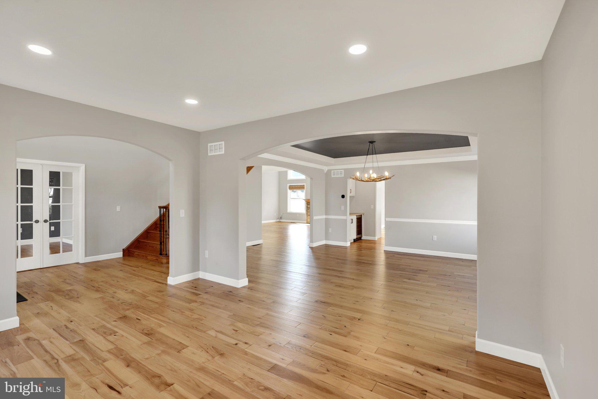 64 Middletown Road Fleetwood, PA 19522 - Photo 6 of 54 a view of a livingroom with wooden floor and a ceiling fan