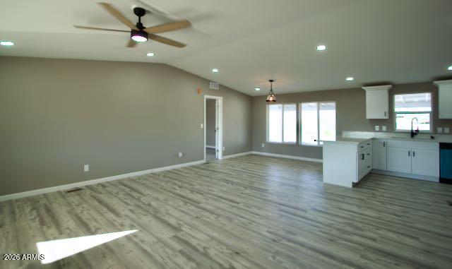 1470 South Bowman Road Apache Junction, AZ 85119 - Photo 18 of 57 a view of a kitchen with a sink and a window