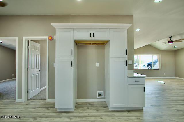 1470 South Bowman Road Apache Junction, AZ 85119 - Photo 25 of 57 a view of a hallway to an empty room and wooden floor