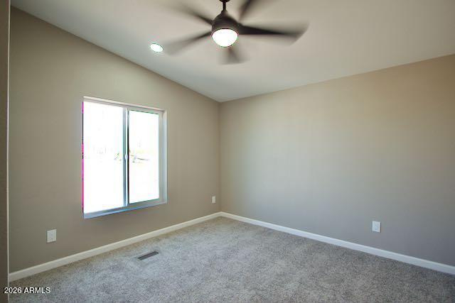 1470 South Bowman Road Apache Junction, AZ 85119 - Photo 30 of 57 an empty room with a window