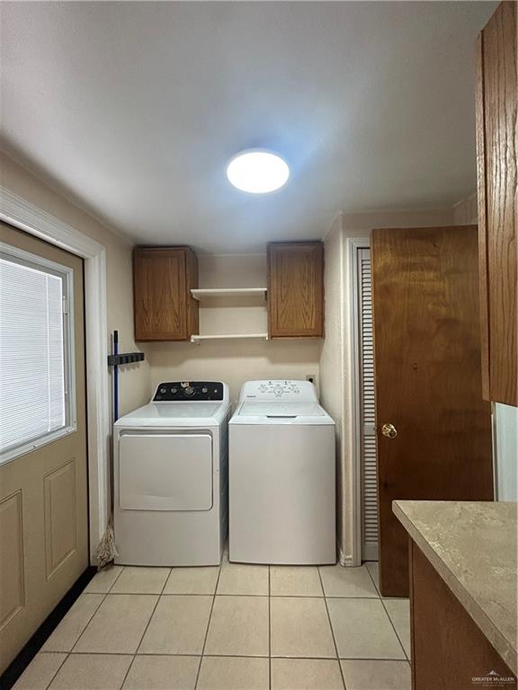 1205 Maple Street Harlingen, TX 78552 - Photo 11 of 23 a view of kitchen and washer and dryer