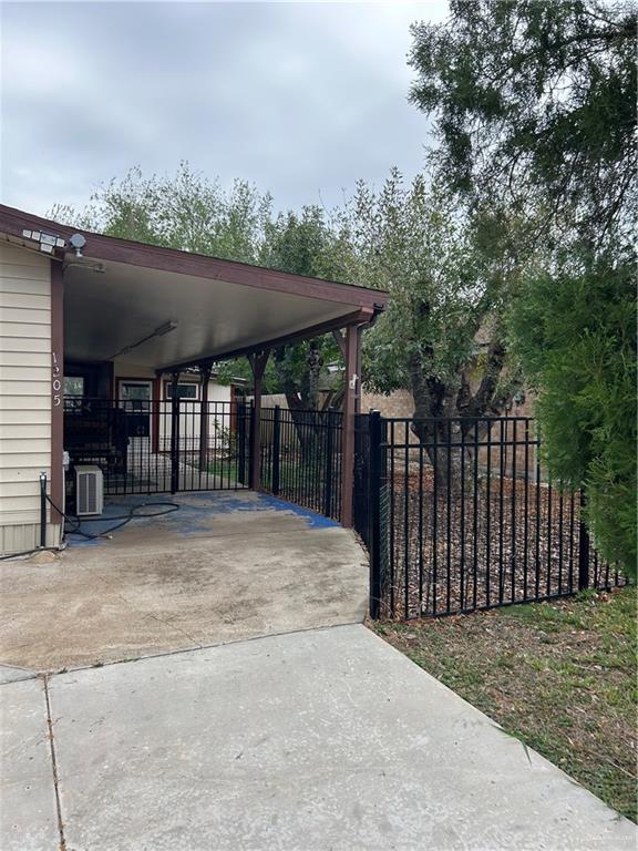 1205 Maple Street Harlingen, TX 78552 - Photo 2 of 23 a view of a backyard