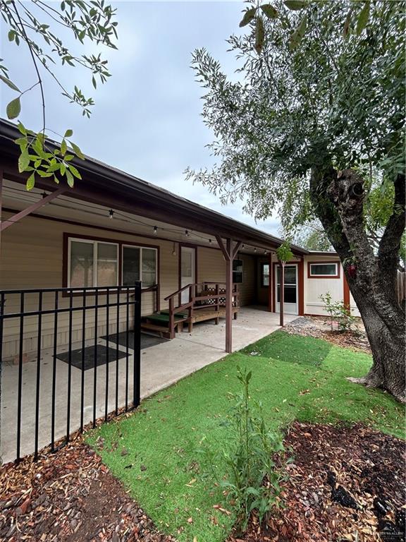 1205 Maple Street Harlingen, TX 78552 - Photo 3 of 23 a house view with a sitting space and garden