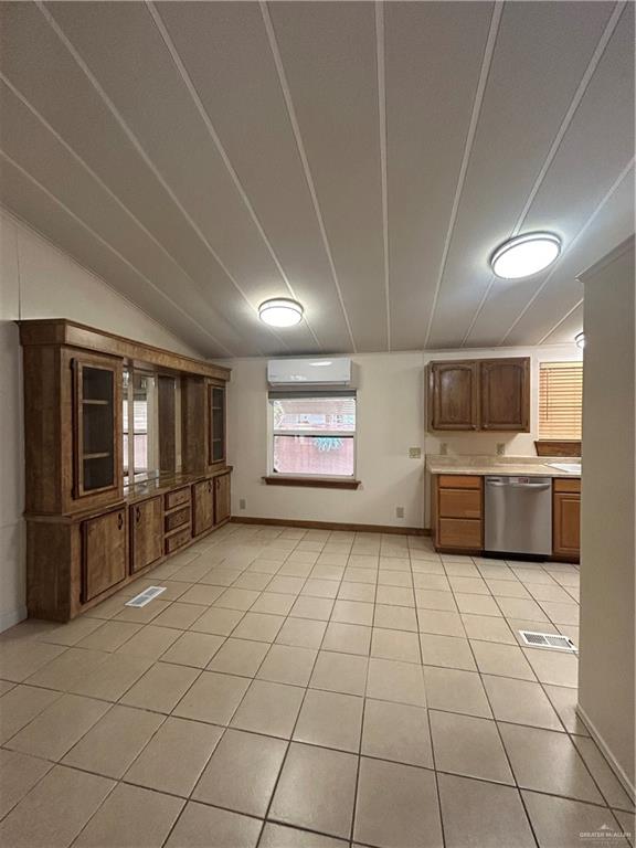 1205 Maple Street Harlingen, TX 78552 - Photo 7 of 23 a view of a refrigerator and window in a room