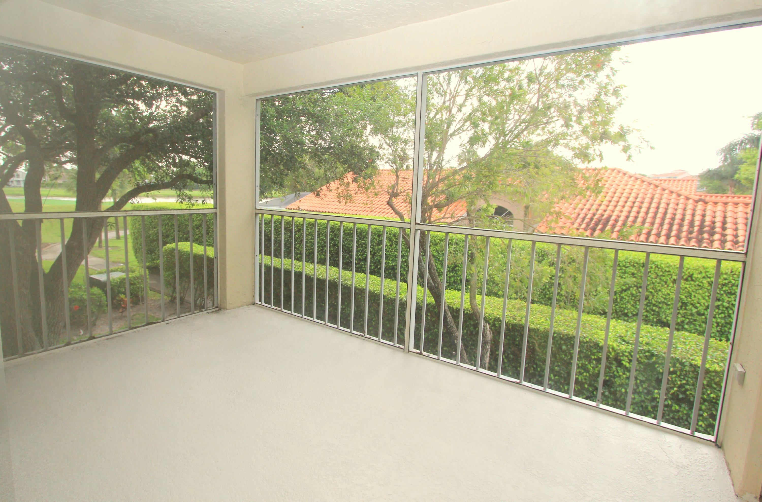 17263 Boca Club Boulevard, Unit 8 Boca Raton, FL 33487 - Photo 19 of 24 screened patio unfurnished