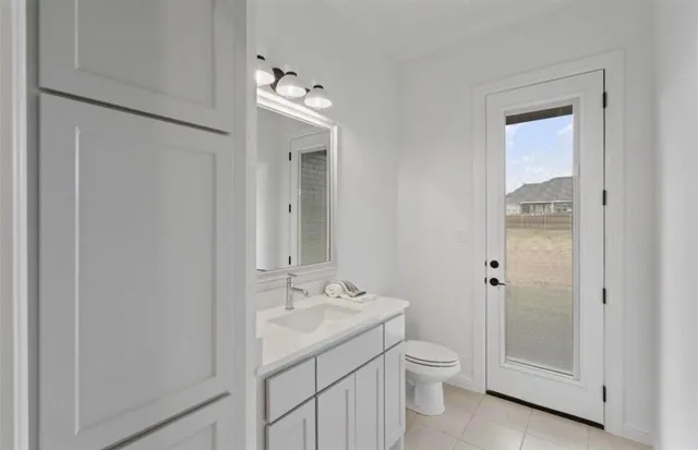 a bedroom with a large bed and a couch