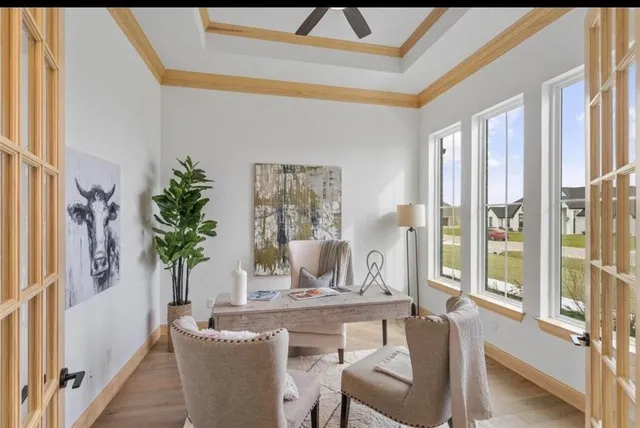 a bedroom with a bed dresser and a window