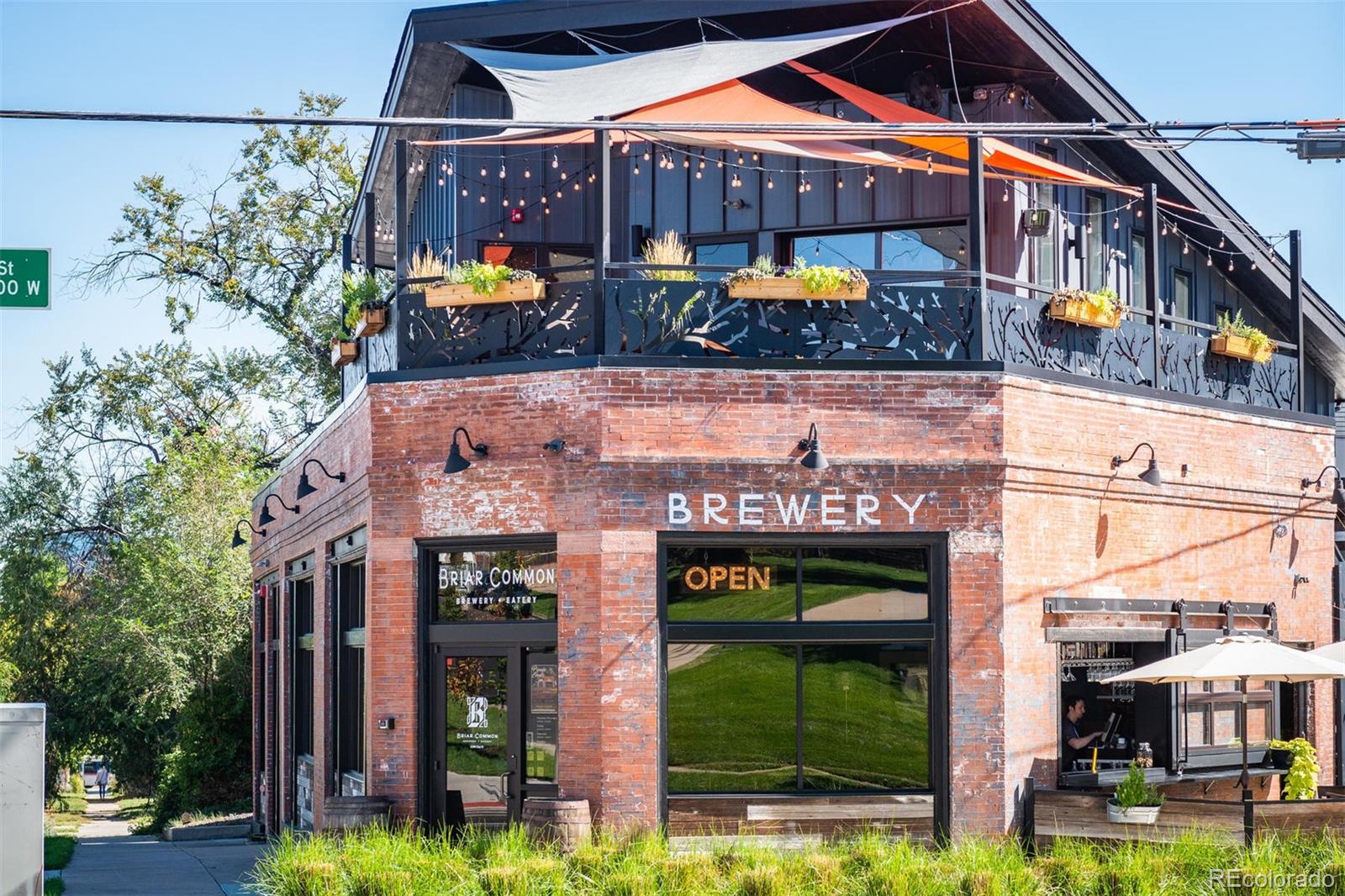 1495 Vrain Street, Unit 311 Denver, CO 80204 - Photo 14 of 16 a view of building with a swimming pool