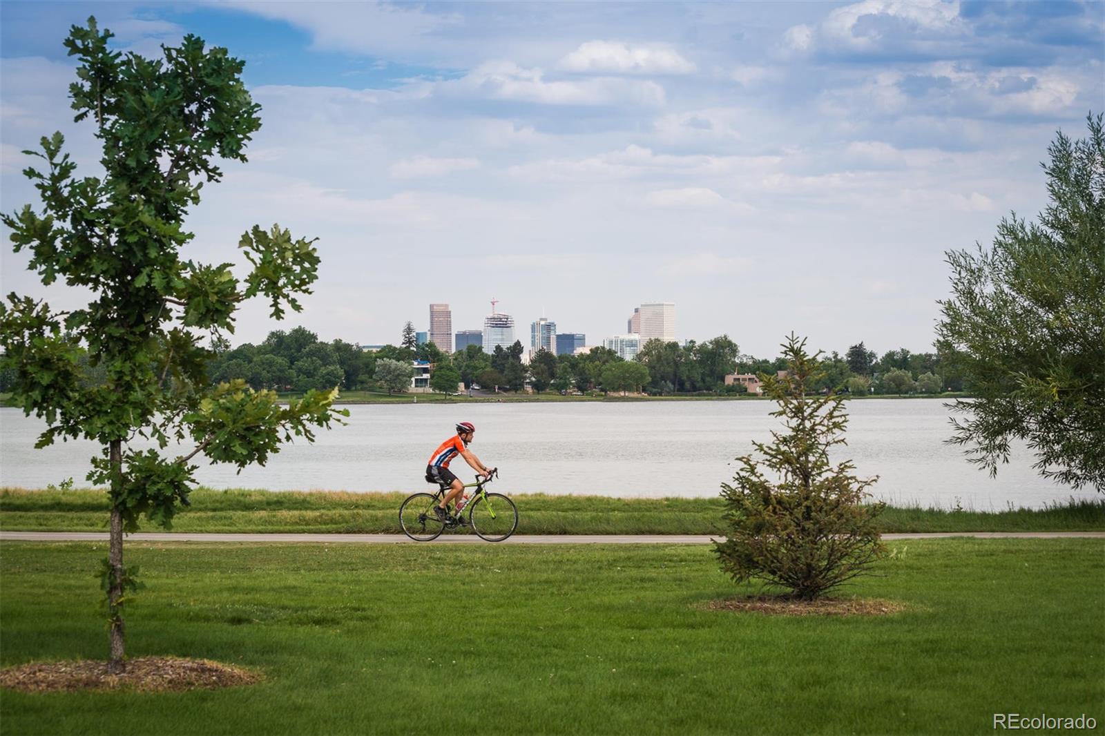 1495 Vrain Street, Unit 311 Denver, CO 80204 - Photo 10 of 16 a view of a lake and a yard