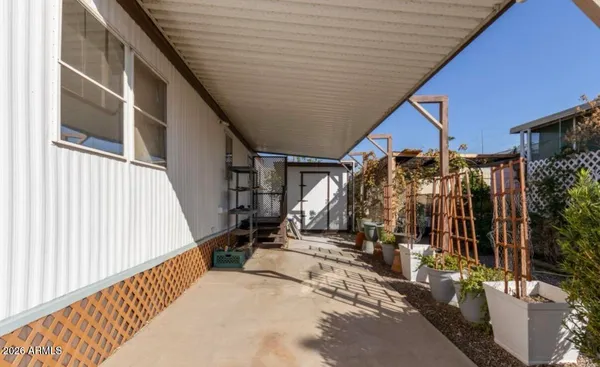 a view of a porch with seating space