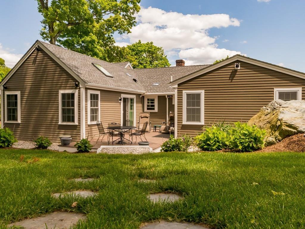 15 Wiswall Road Newton, MA 02459 - Photo 23 of 23 a front view of house with yard and green space