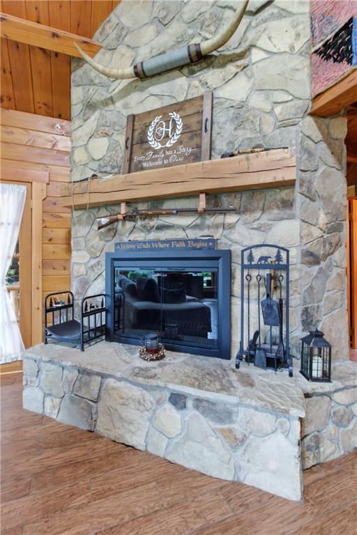 1089 Fire Tower Road Reynoldsville, PA 15851 - Photo 11 of 42 a view of a fireplace with a wooden floor