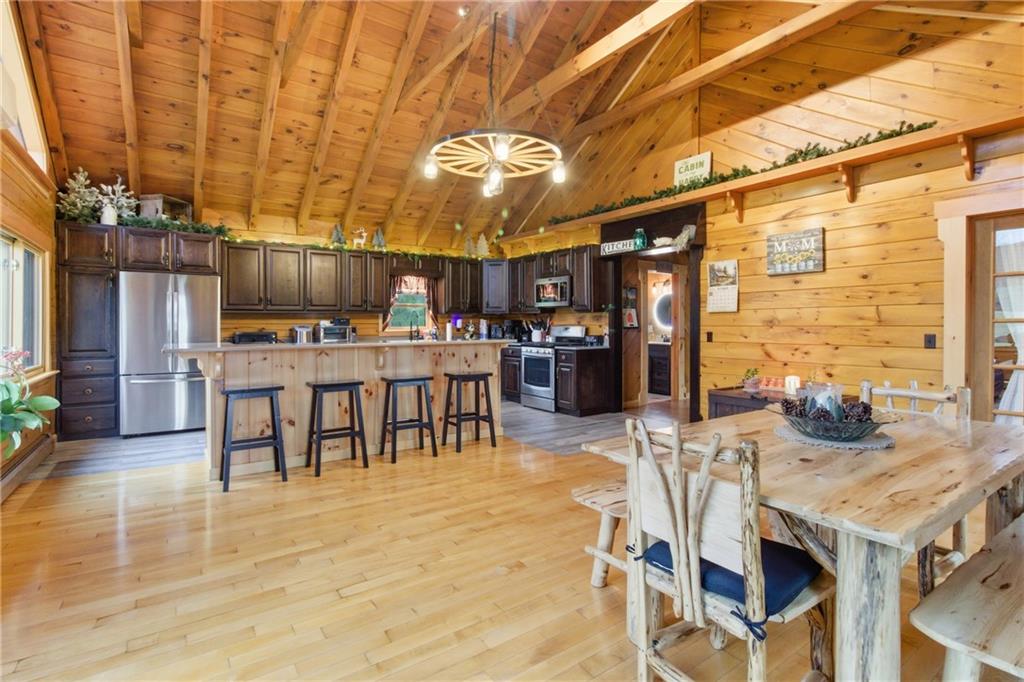 1089 Fire Tower Road Reynoldsville, PA 15851 - Photo 16 of 42 a view of a dining room with furniture and chandelier