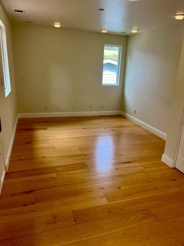 a view of an ocean & kitchen