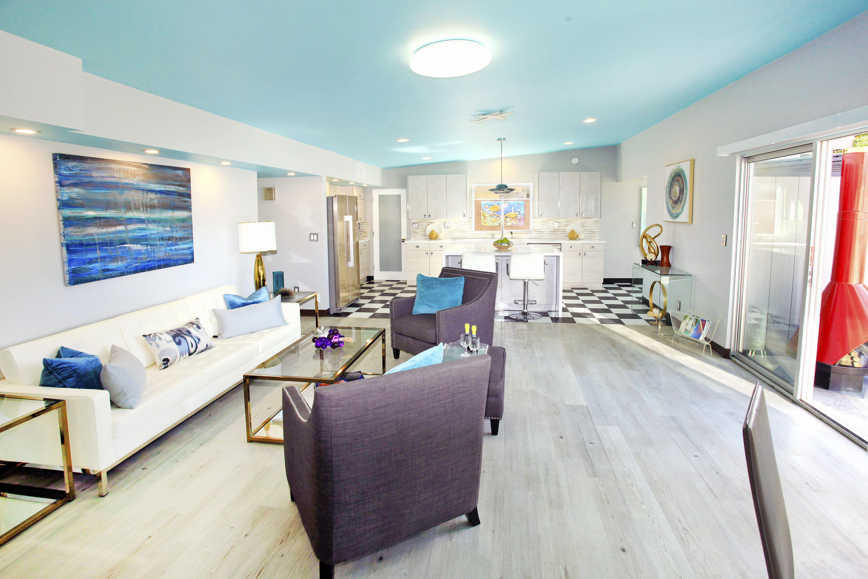 71991 Vista Del Rio Rancho Mirage, CA 92270 - Photo 11 of 34 a living room with furniture and a flat screen tv