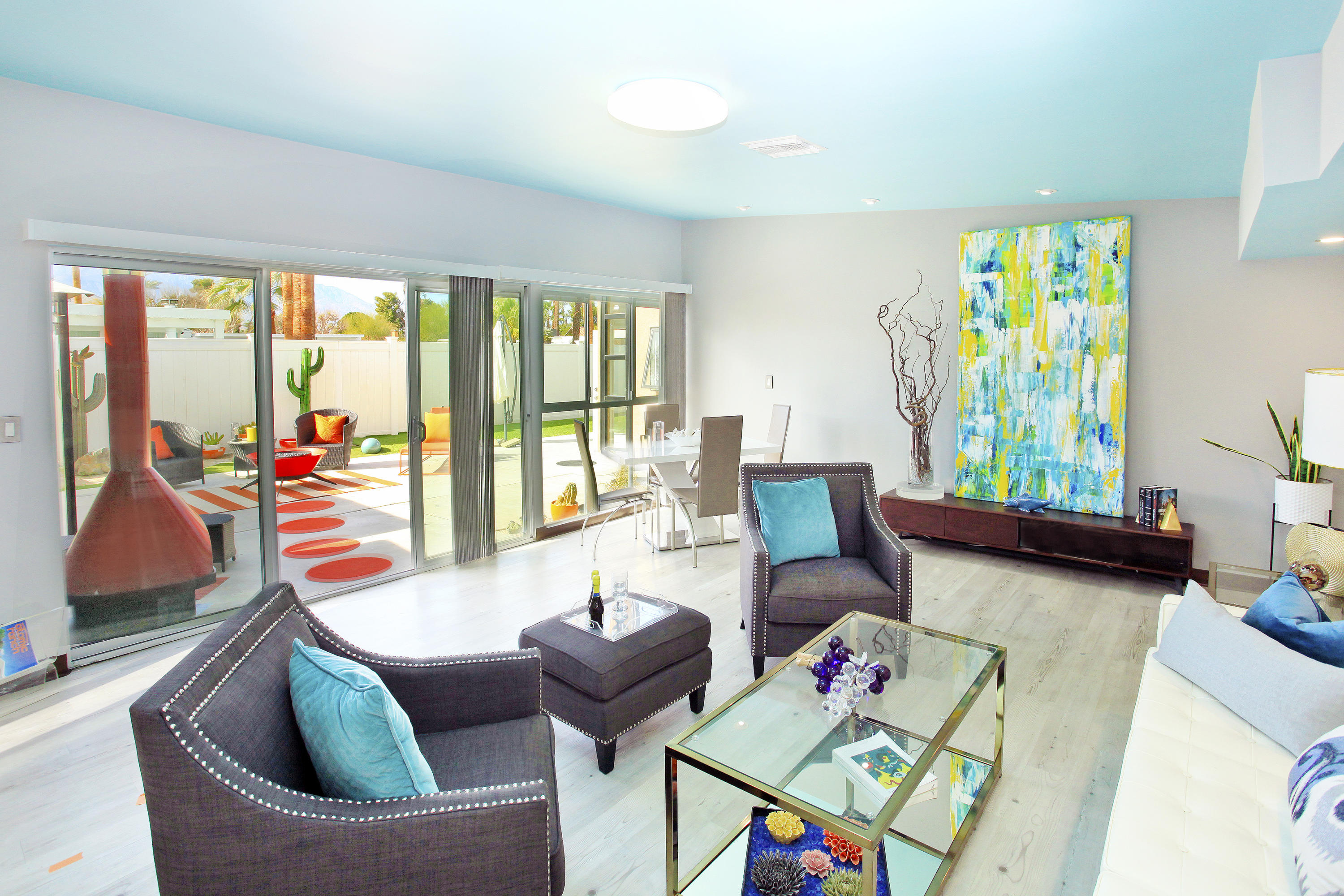 71991 Vista Del Rio Rancho Mirage, CA 92270 - Photo 12 of 34 a living room filled with furniture and a floor to ceiling window