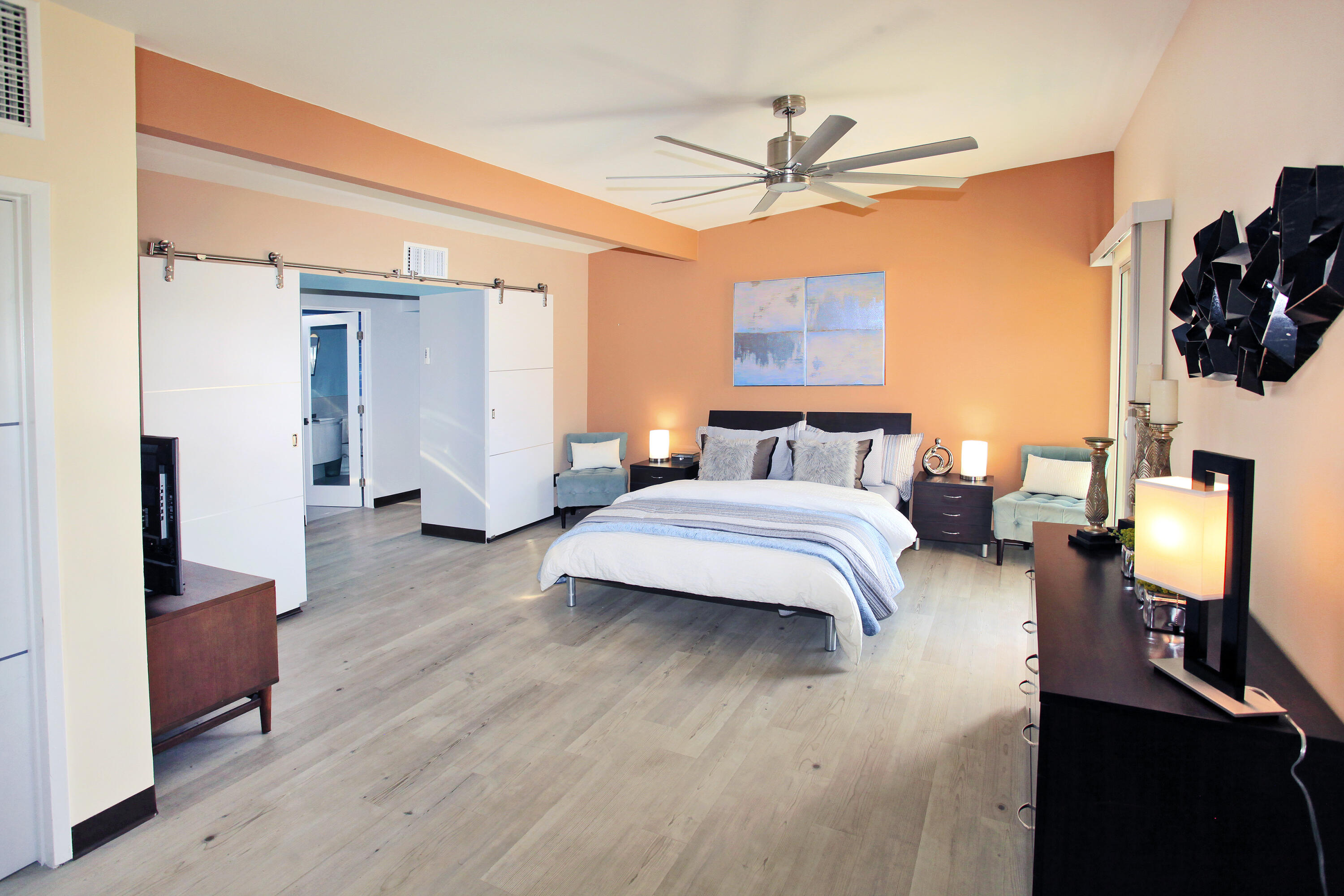 71991 Vista Del Rio Rancho Mirage, CA 92270 - Photo 17 of 34 a bedroom with a bed and wooden floor