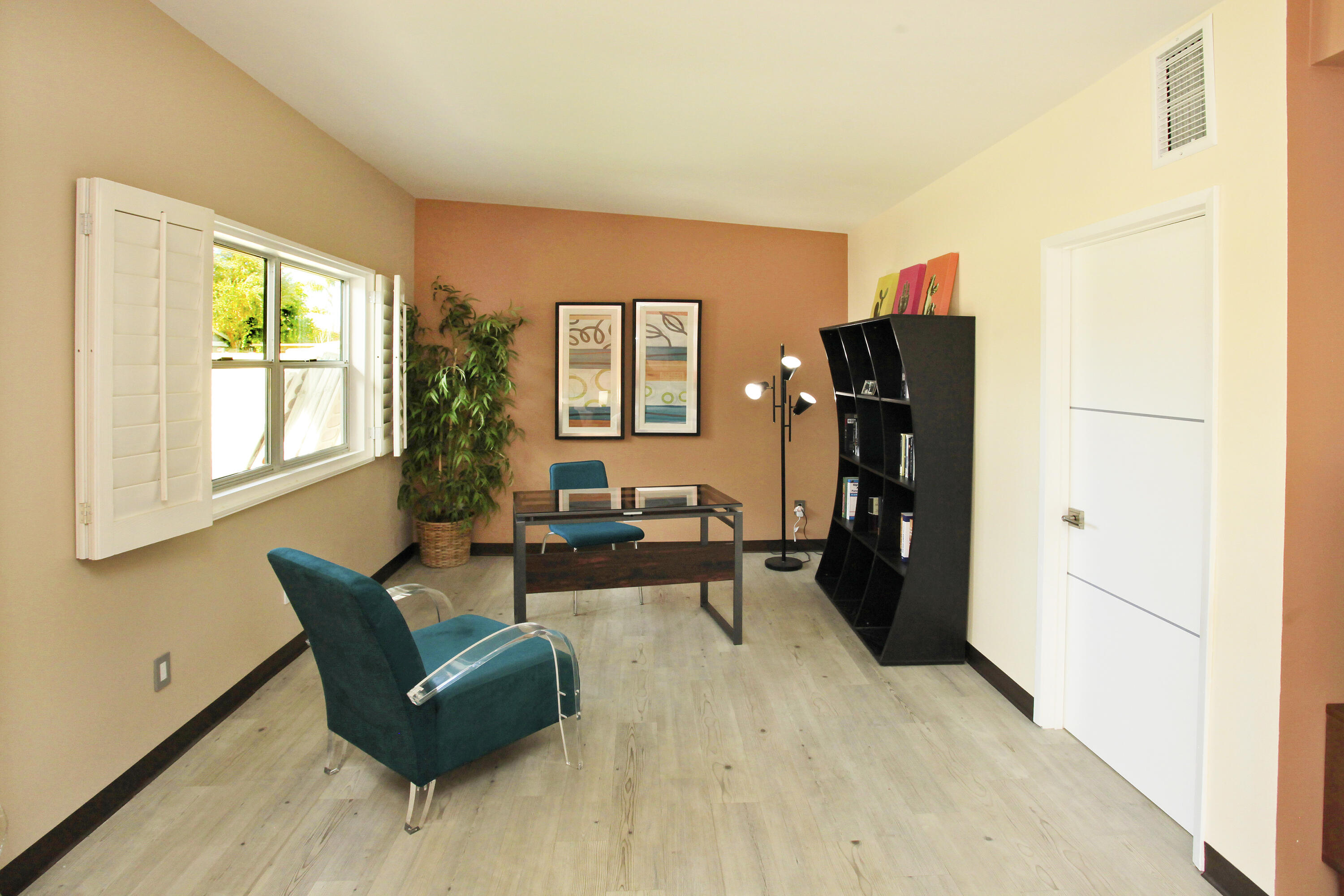 71991 Vista Del Rio Rancho Mirage, CA 92270 - Photo 20 of 34 a living room with furniture and a large window