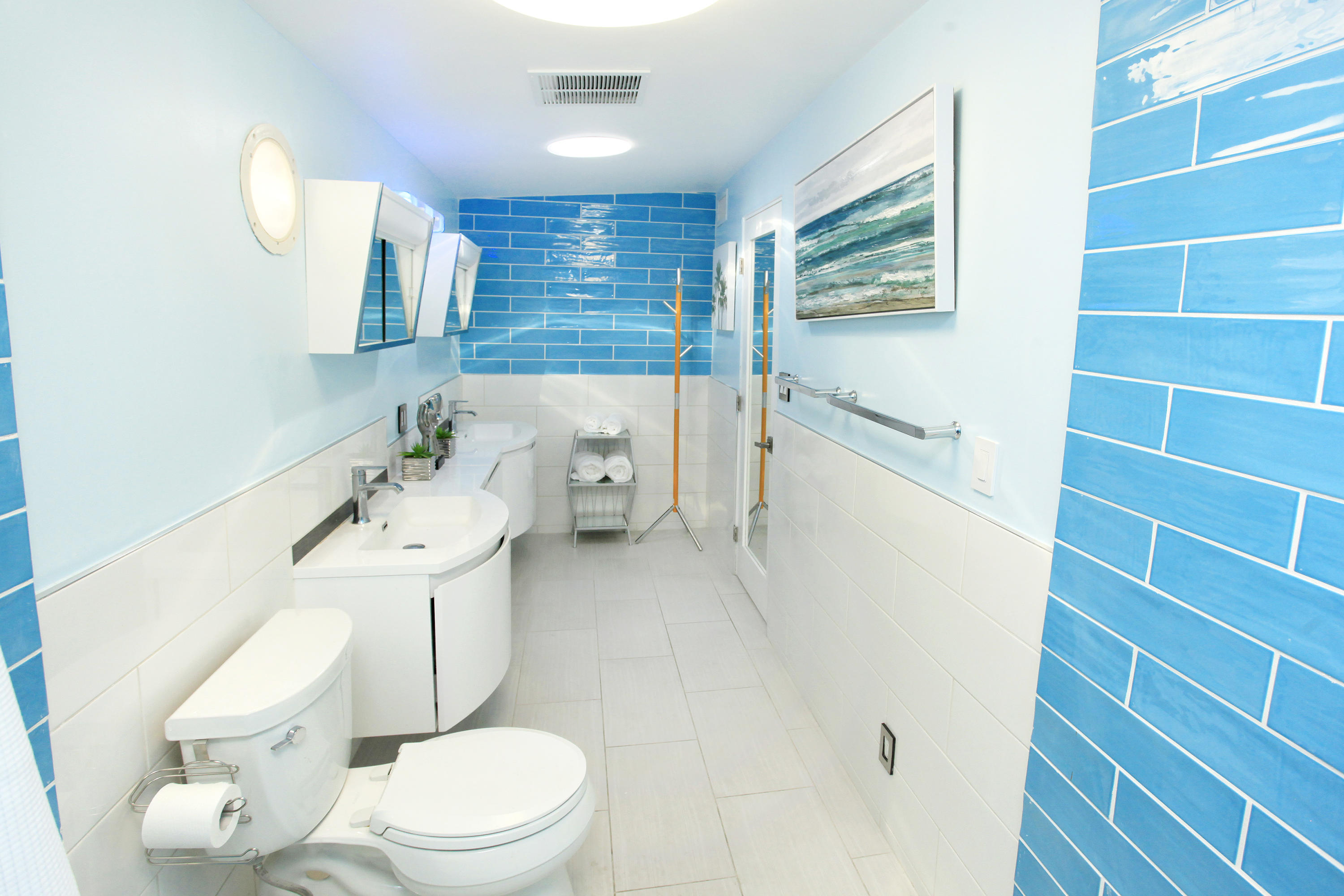 71991 Vista Del Rio Rancho Mirage, CA 92270 - Photo 22 of 34 a white toilet sitting next to a bathroom sink