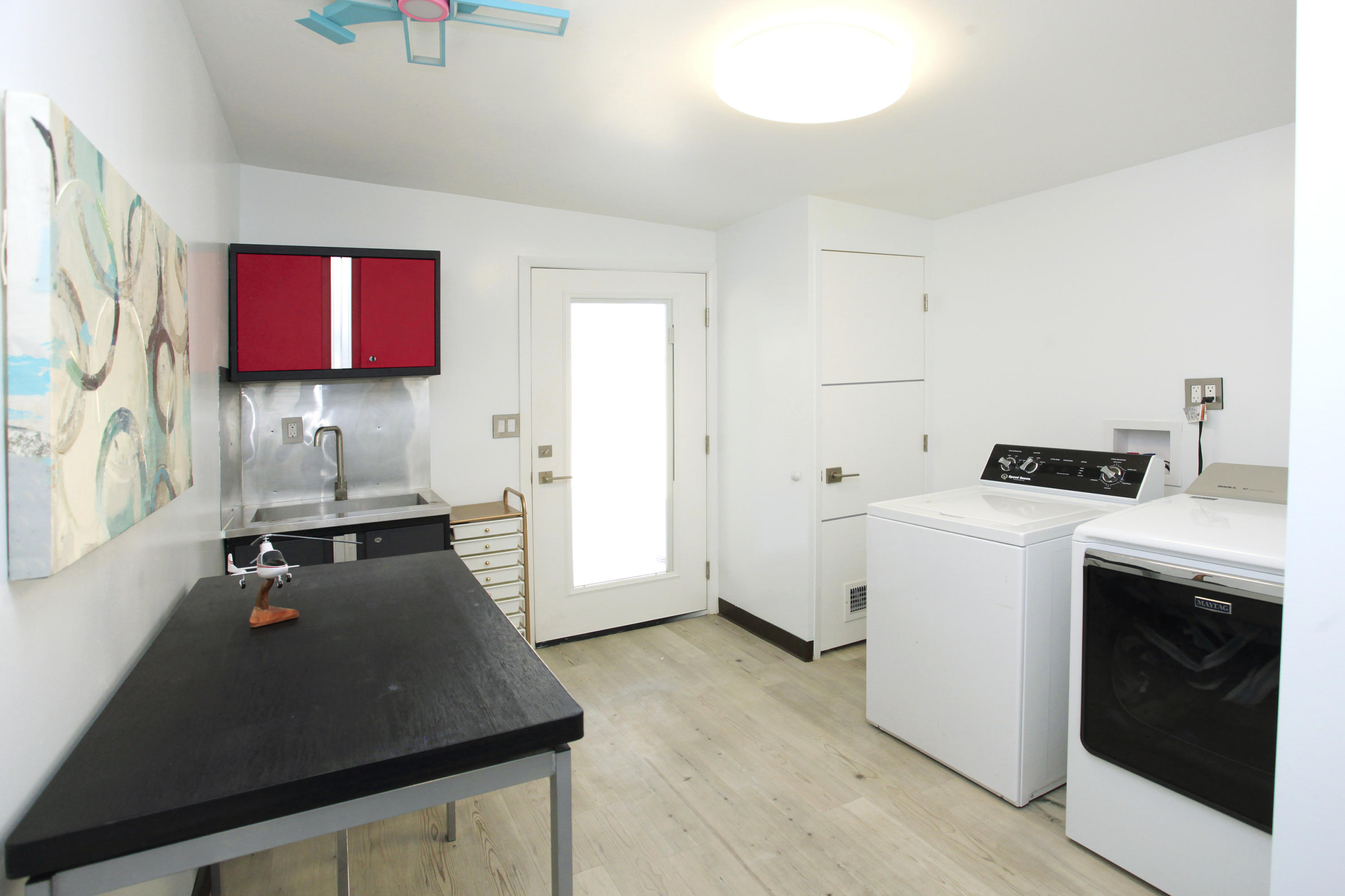 71991 Vista Del Rio Rancho Mirage, CA 92270 - Photo 28 of 34 a kitchen with a stove and a white refrigerator
