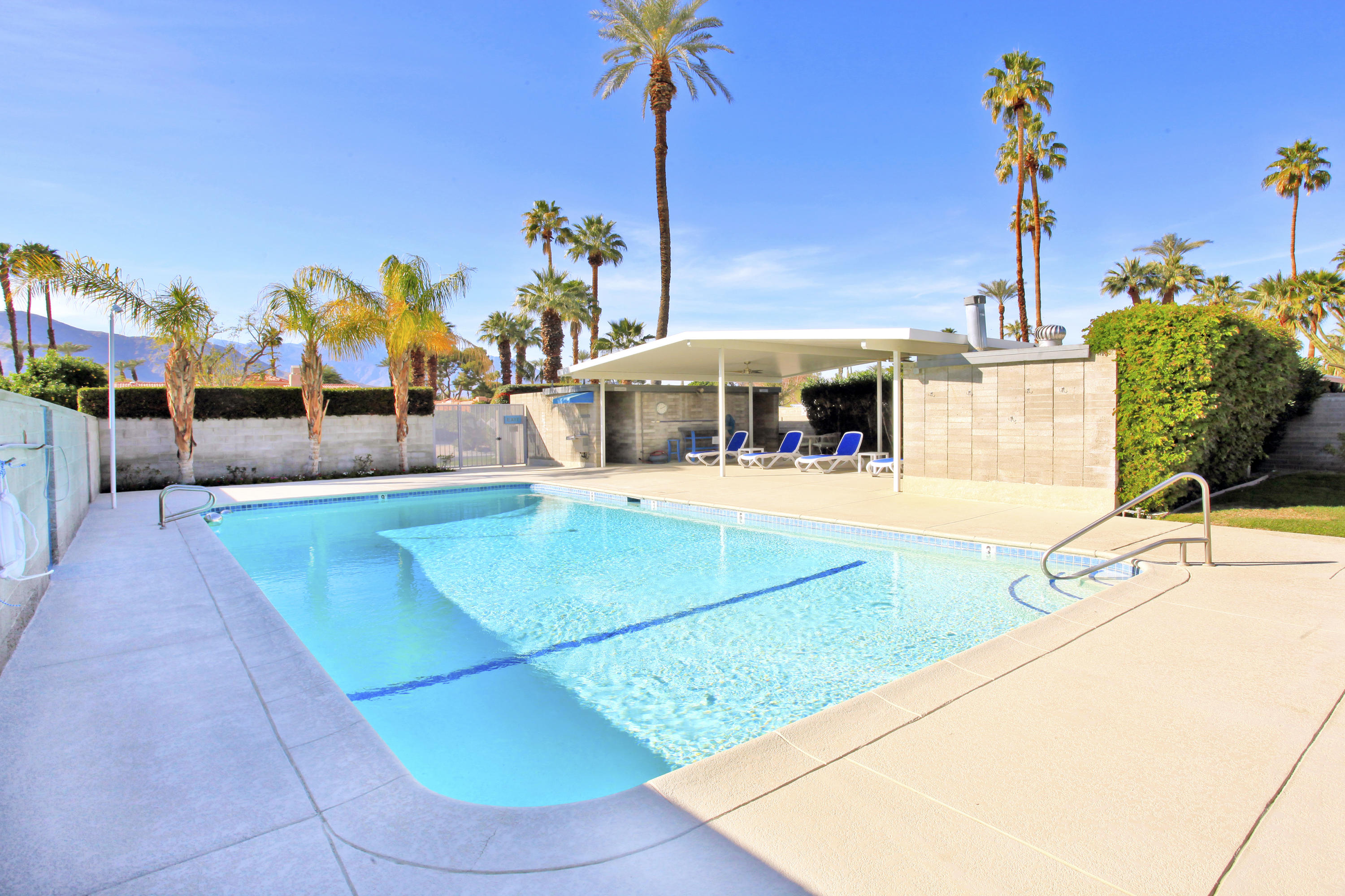 71991 Vista Del Rio Rancho Mirage, CA 92270 - Photo 33 of 34 a view of a swimming pool with a patio