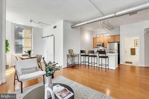 a view of a balcony with a tree