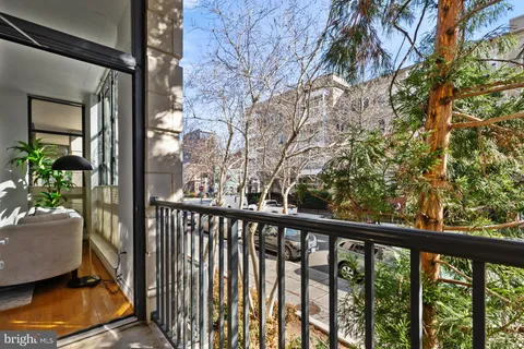 a bedroom with a bed and a view of bathroom