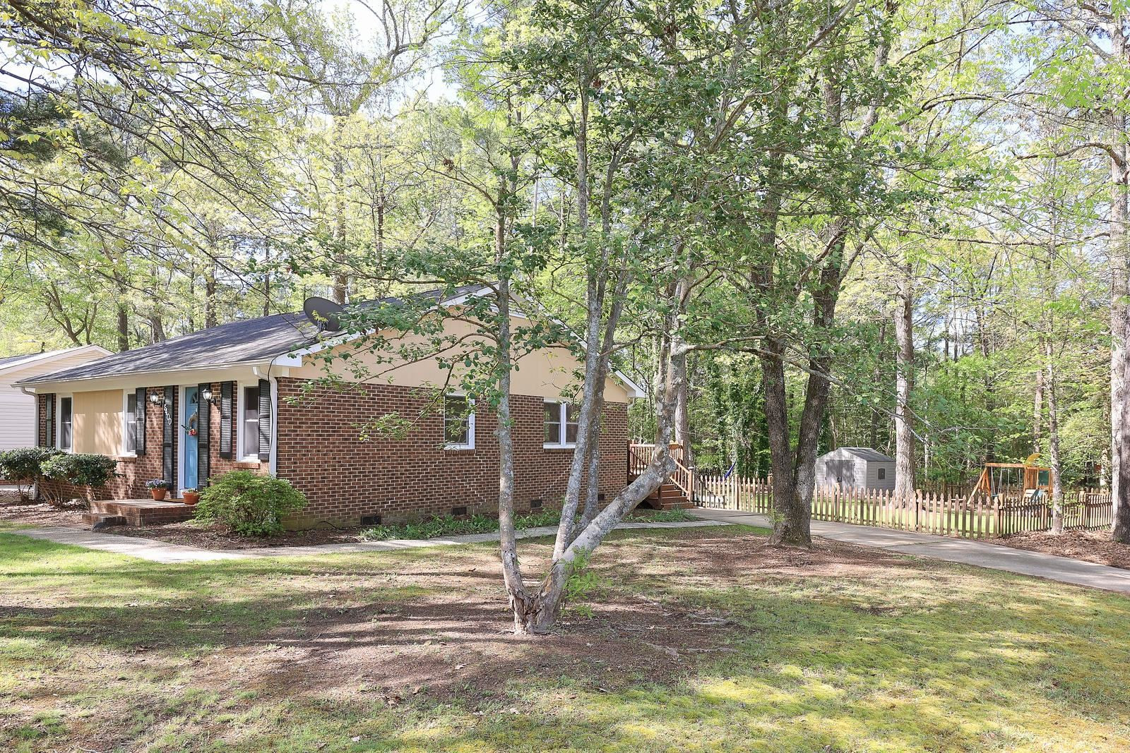 5400 McCormick Road Durham, NC 27713 - Photo 24 of 26 Side view from front yard. Lovely trees.