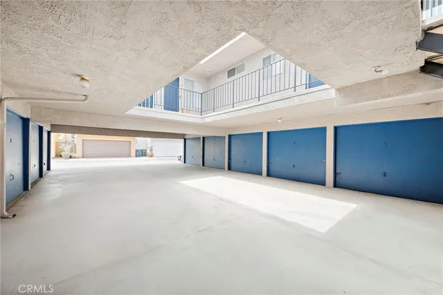 a view of an empty room with closet