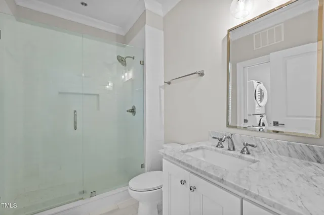 a bedroom with bed and window