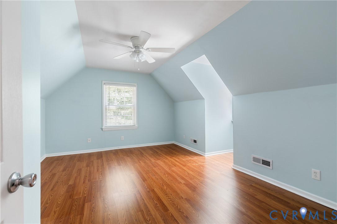 3114 Shiloh Church Road Midlothian, VA 23112 - Photo 20 of 34 Bright upper-level bedroom featuring angled vaulte