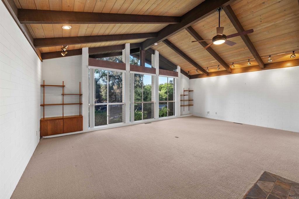 16522 Orchard Bend Road Poway, CA 92064 - Photo 4 of 26 a view of an empty room with a balcony