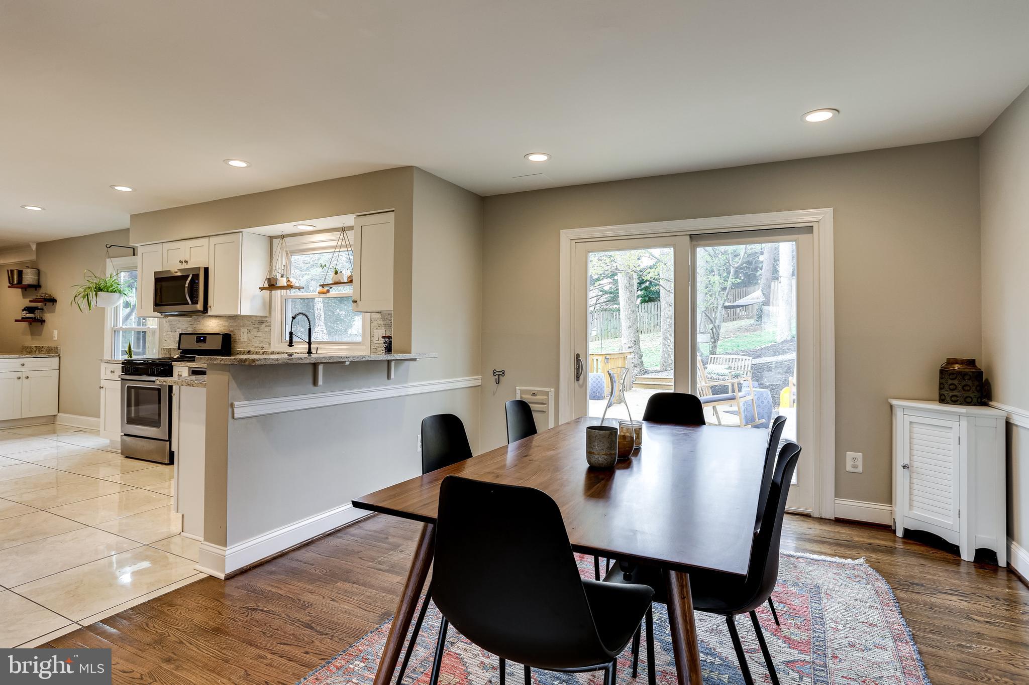 Dining room with access to kitchen & back deck