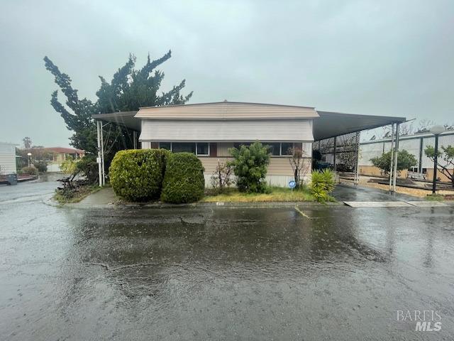 a view of a porch with seating space