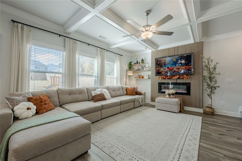 3593 Dover Run Lane Loganville, GA 30052 - Photo 15 of 54 a living room with furniture and a large window