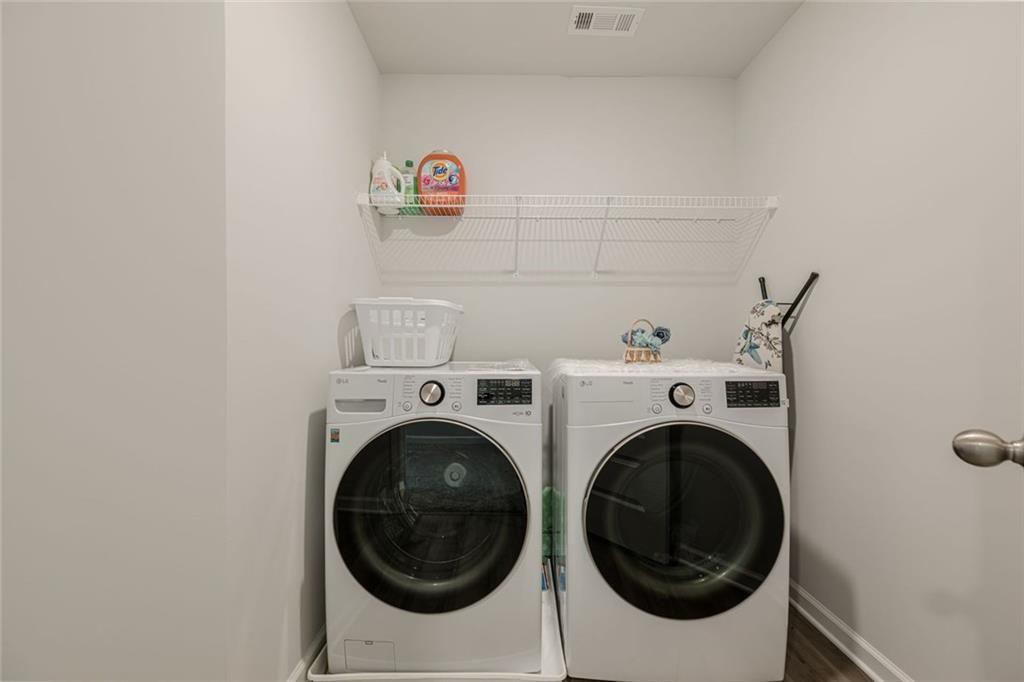3593 Dover Run Lane Loganville, GA 30052 - Photo 35 of 54 a utility room with dryer and washer