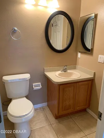 a bathroom with a toilet and a sink