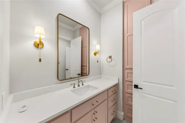 a bathroom with a double vanity sink mirror and double