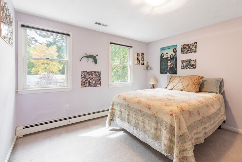 21 Longacre Road Needham, MA 02492 - Photo 26 of 41 a bedroom with a bed and a window