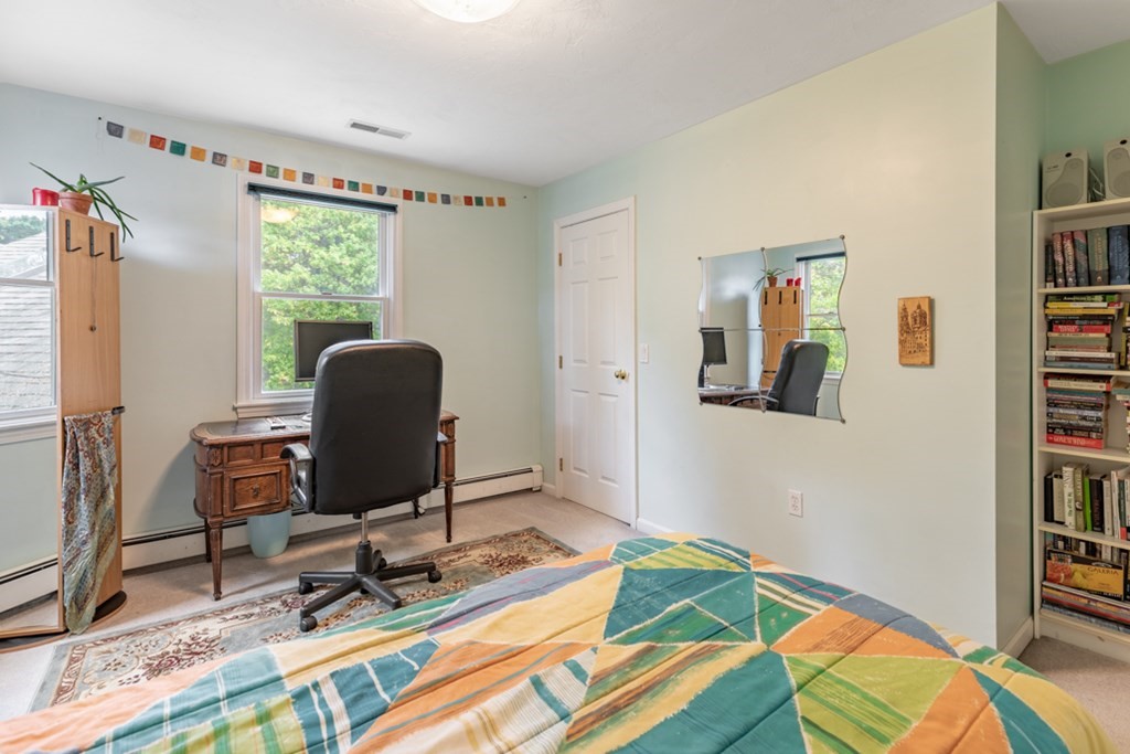 21 Longacre Road Needham, MA 02492 - Photo 29 of 41 a workspace with furniture and a window