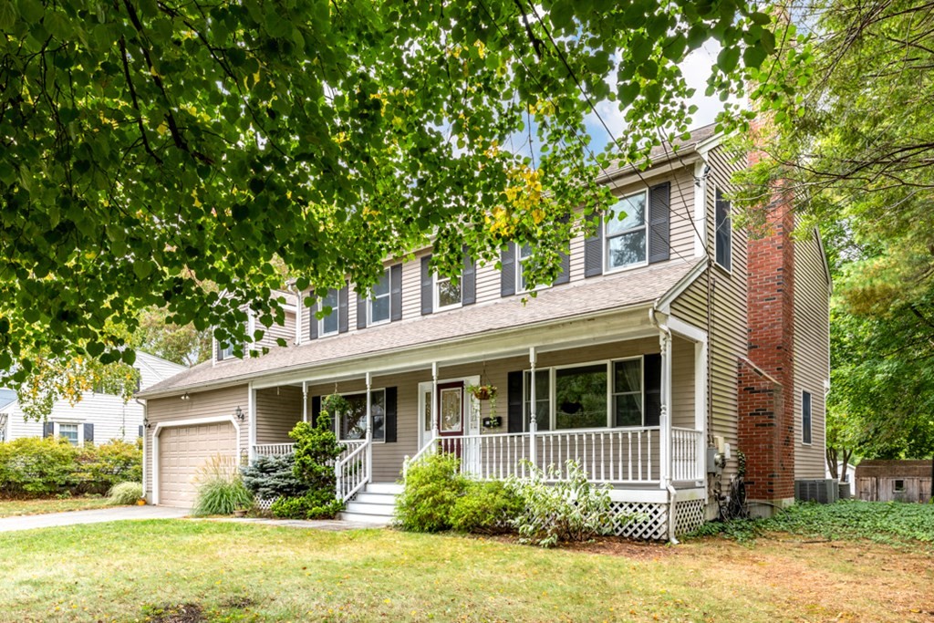 21 Longacre Road Needham, MA 02492 - Photo 3 of 41 a front view of a house with garden