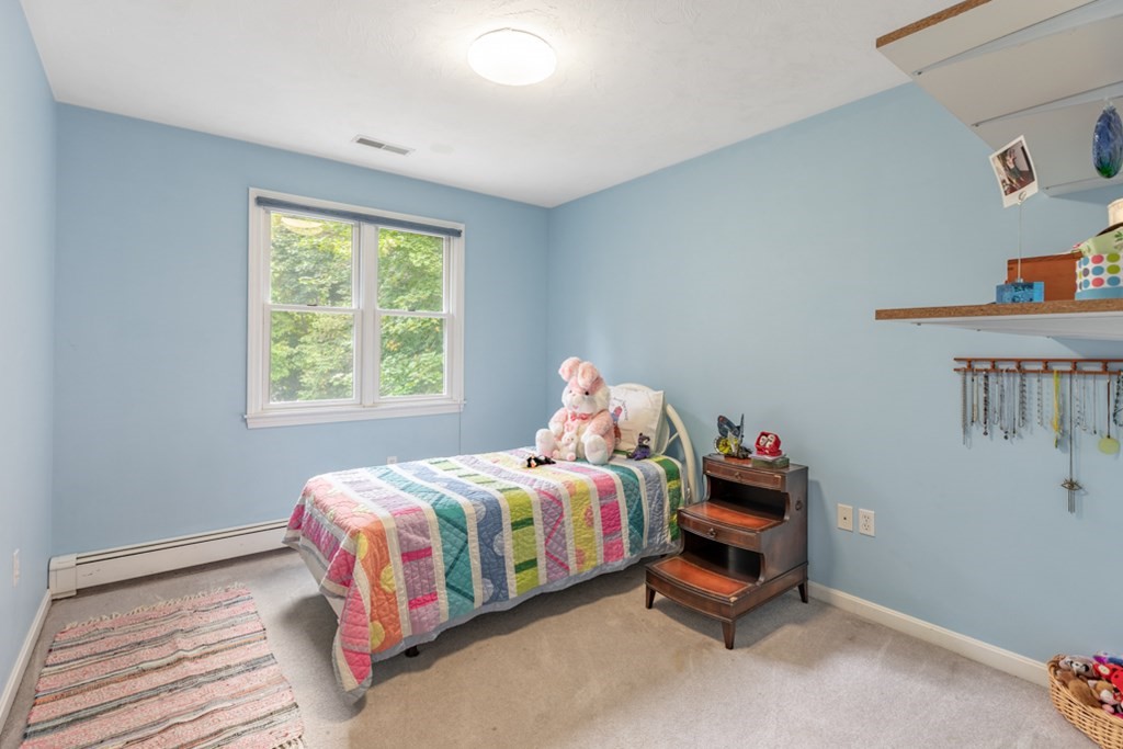 21 Longacre Road Needham, MA 02492 - Photo 34 of 41 a bedroom with a bed and a window