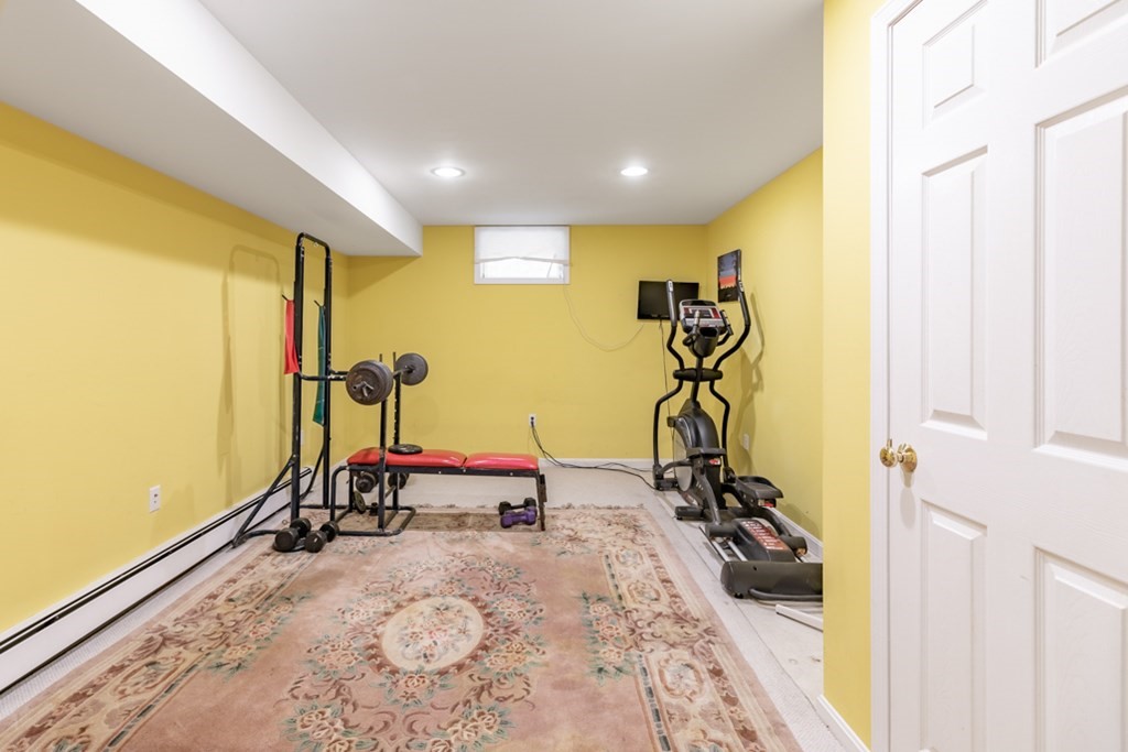 21 Longacre Road Needham, MA 02492 - Photo 38 of 41 a view of a room with gym equipment