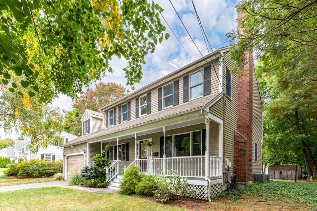 21 Longacre Road Needham, MA 02492 - Photo 4 of 41 a front view of a house with a yard