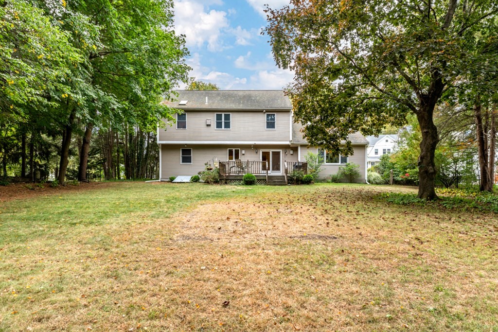 21 Longacre Road Needham, MA 02492 - Photo 41 of 41 a front view of a house with a yard