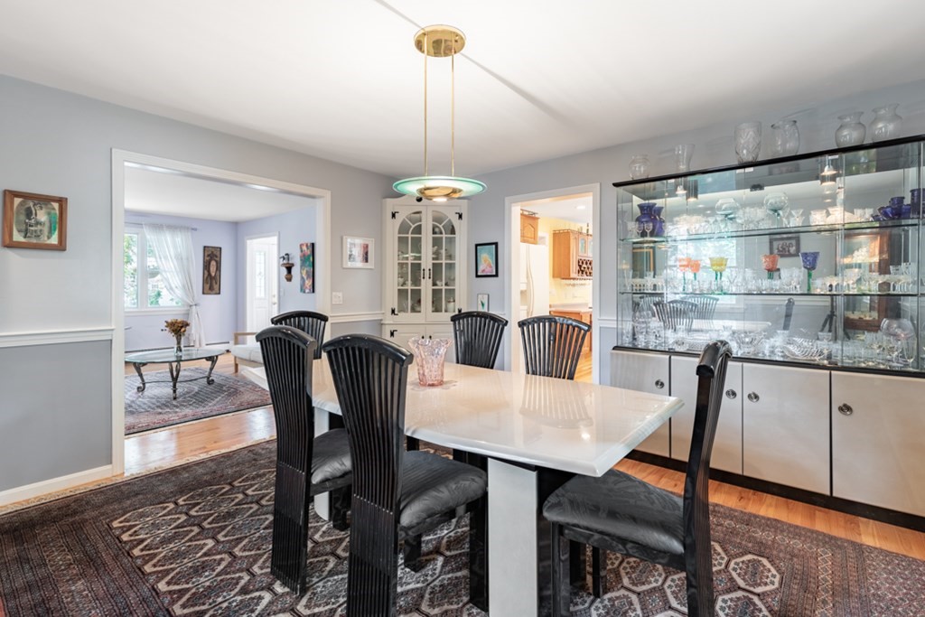 21 Longacre Road Needham, MA 02492 - Photo 10 of 41 a view of a dining room with furniture window and wooden floor